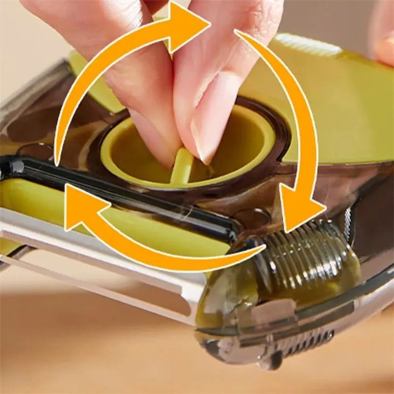 Finger rotating the blade head of the TriPeel with one flick